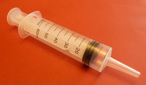 Syringe to manage slip/tints